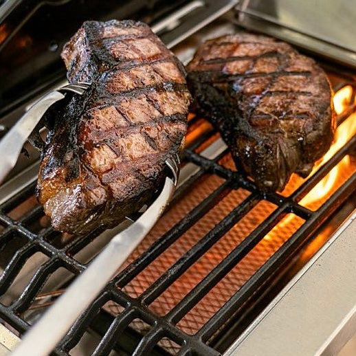 Nexgrill 5 Burner Gas Grill with Gourmet Plus Cooking System. Cover included.